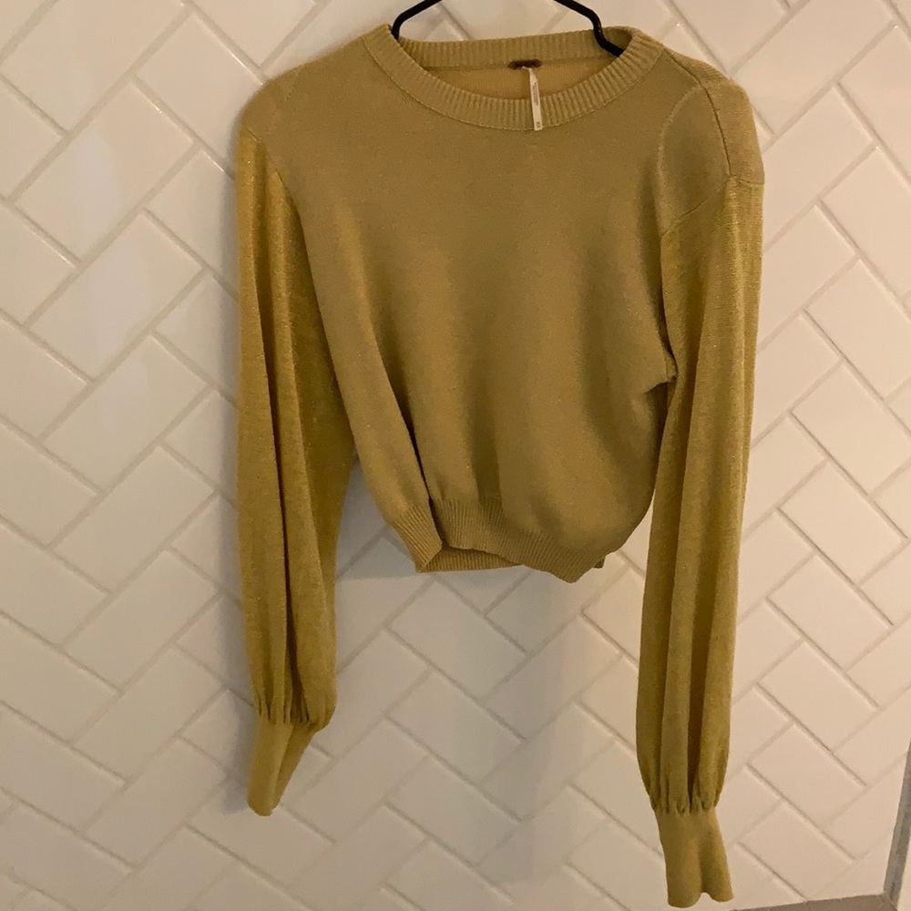 Free people yellow sweater with slight shine.